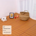 Ten wood grain plastic floor tiles stacked, showing dark grey and light grey colour options with non-slip texture.