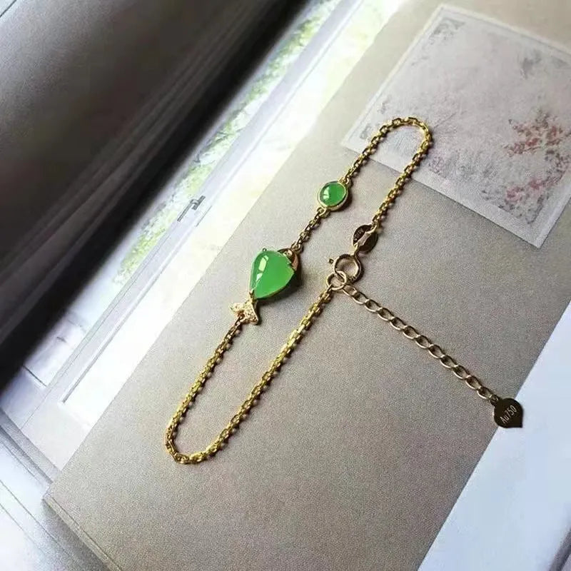 Yellow gold electroplated copper bracelet with plastic elements in retro style