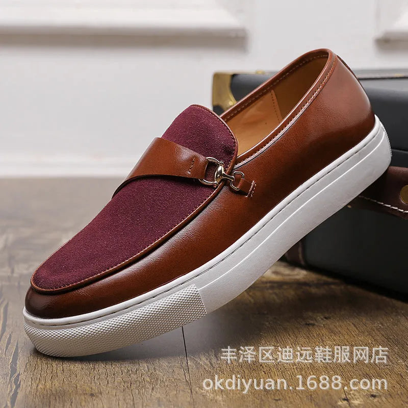 Men's black artificial leather slip-on shoes with a gold horsebit buckle and round toe on a rubber sole.