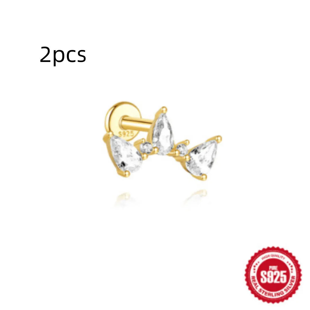 S925 sterling silver water drop shaped earrings with a flat spiral geometric design on a white background.