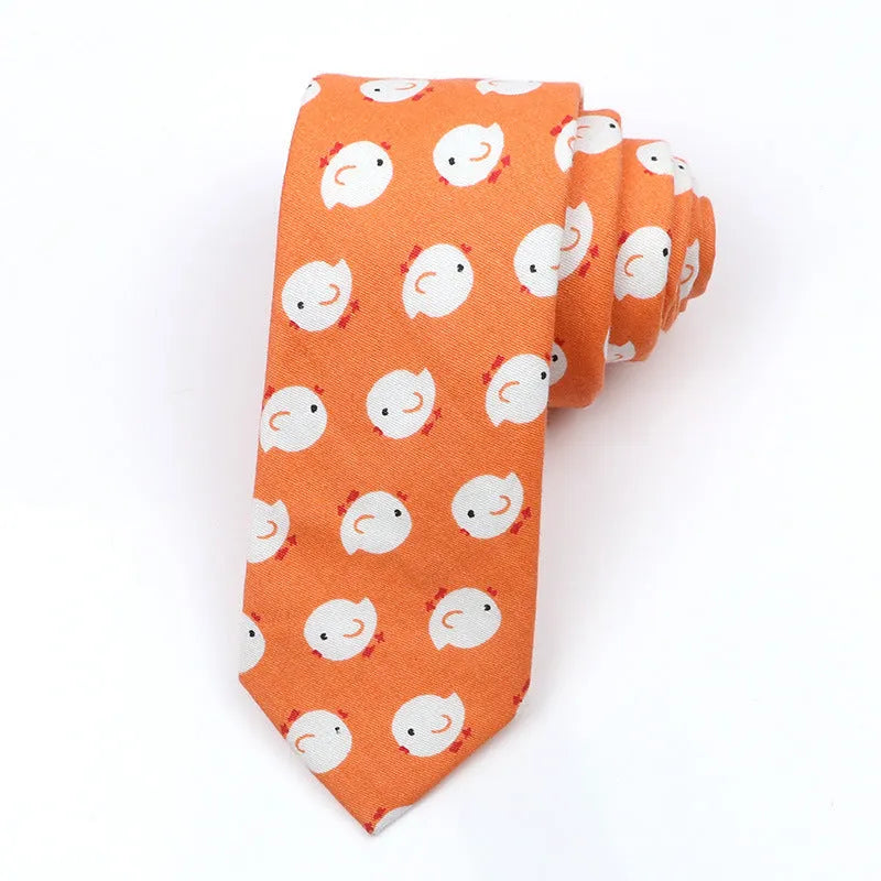Narrow Korean style cotton bow tie with a printed cartoon pattern in various colours.