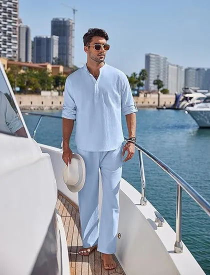 Men's solid colour cotton casual suit with long sleeves and trousers on a hanger.