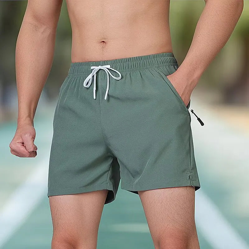 Black ice silk polyester fitness shorts with high waist and drawstring, shown flat.