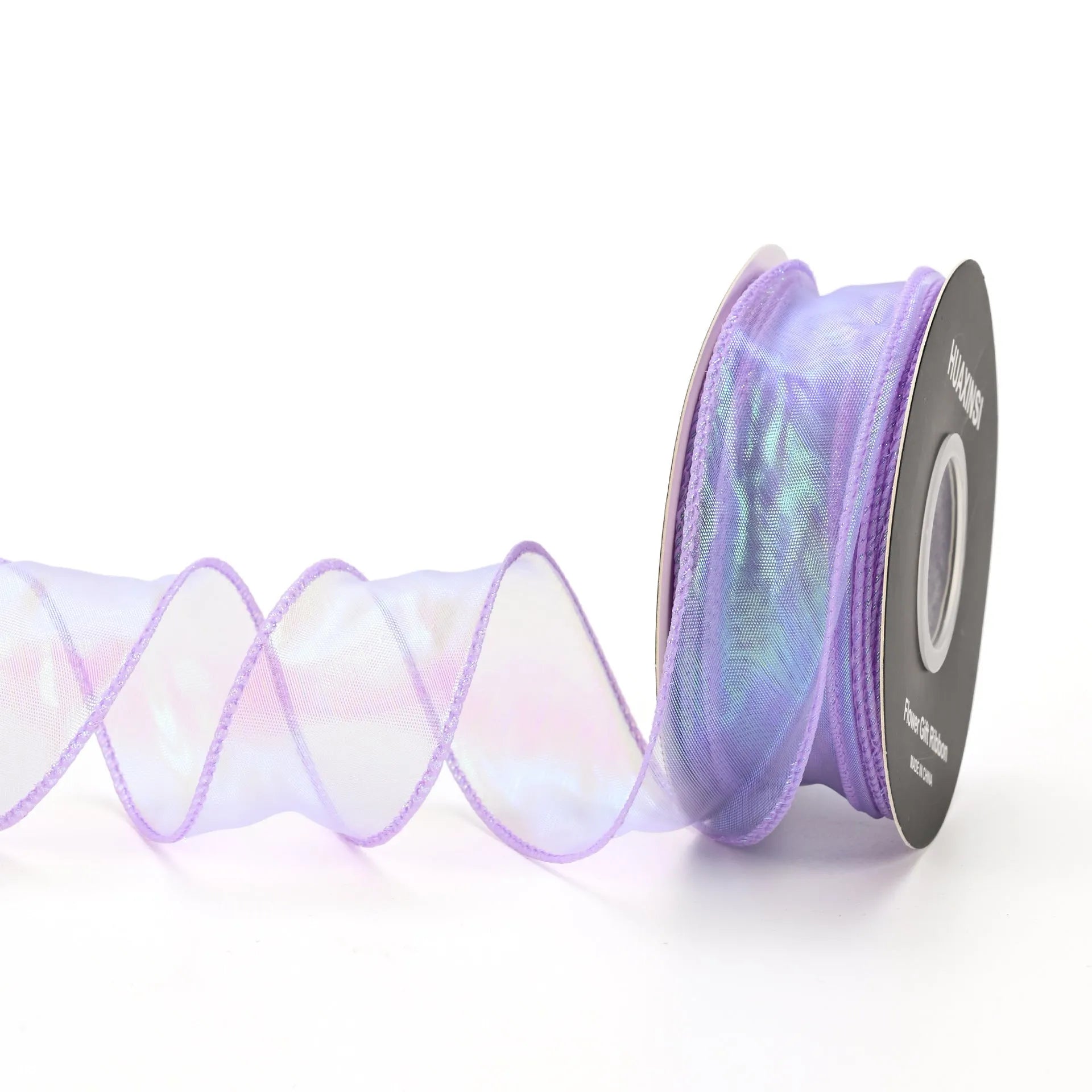 Roll of colourful fishtail yarn mesh decorative ribbon showing wave texture and multiple colour options