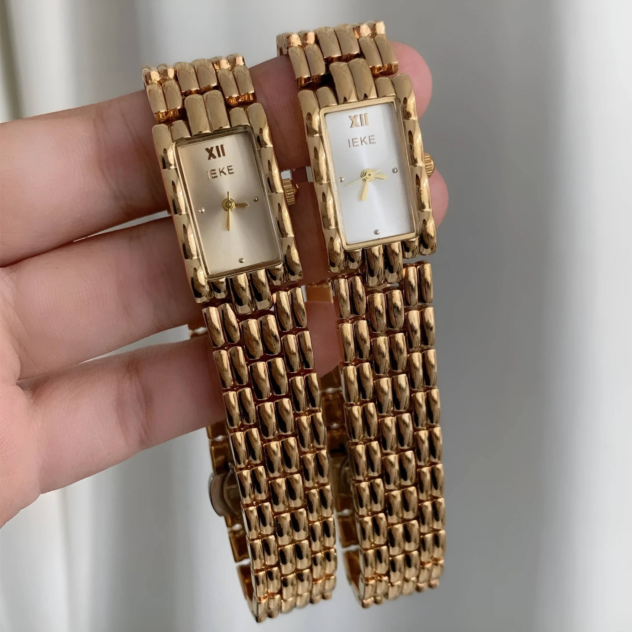 Women's mid-ancient style bracelet watch with spiral crown and mineral glass, available in gold and silver colour variations