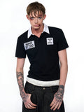 Black slim fit men's polo collar short sleeve T-shirt with embroidery detail on front.