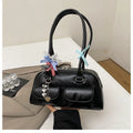 Women's black PU leather pillow shoulder bag with retro one-shoulder design and double straps