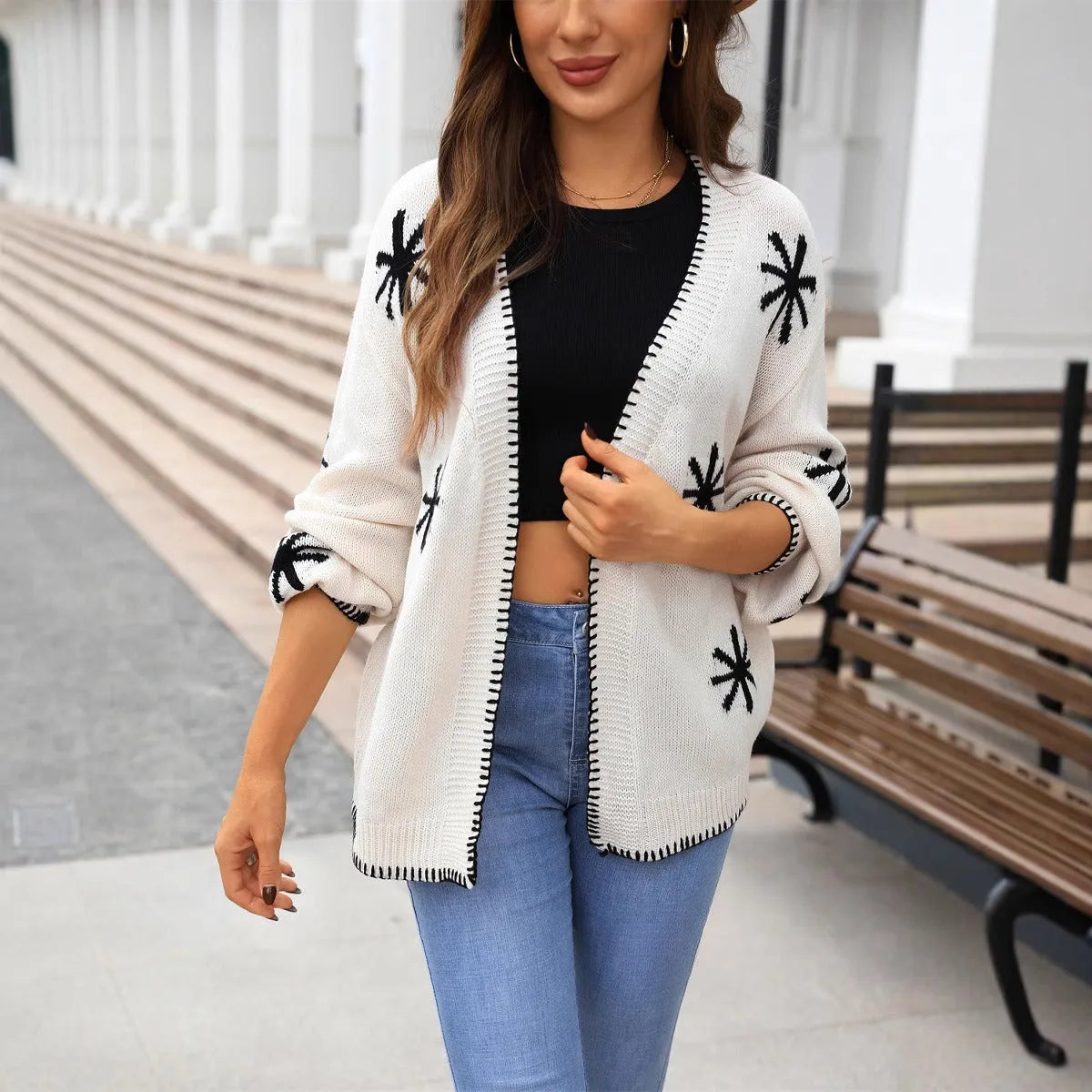 Beige plus size women's knitted cardigan coat with jacquard flower pattern, loose off-neck street fashion style.