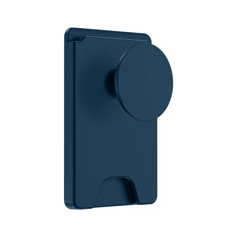 Minimalist black magnetic suction phone holder for iPhone on a desk.