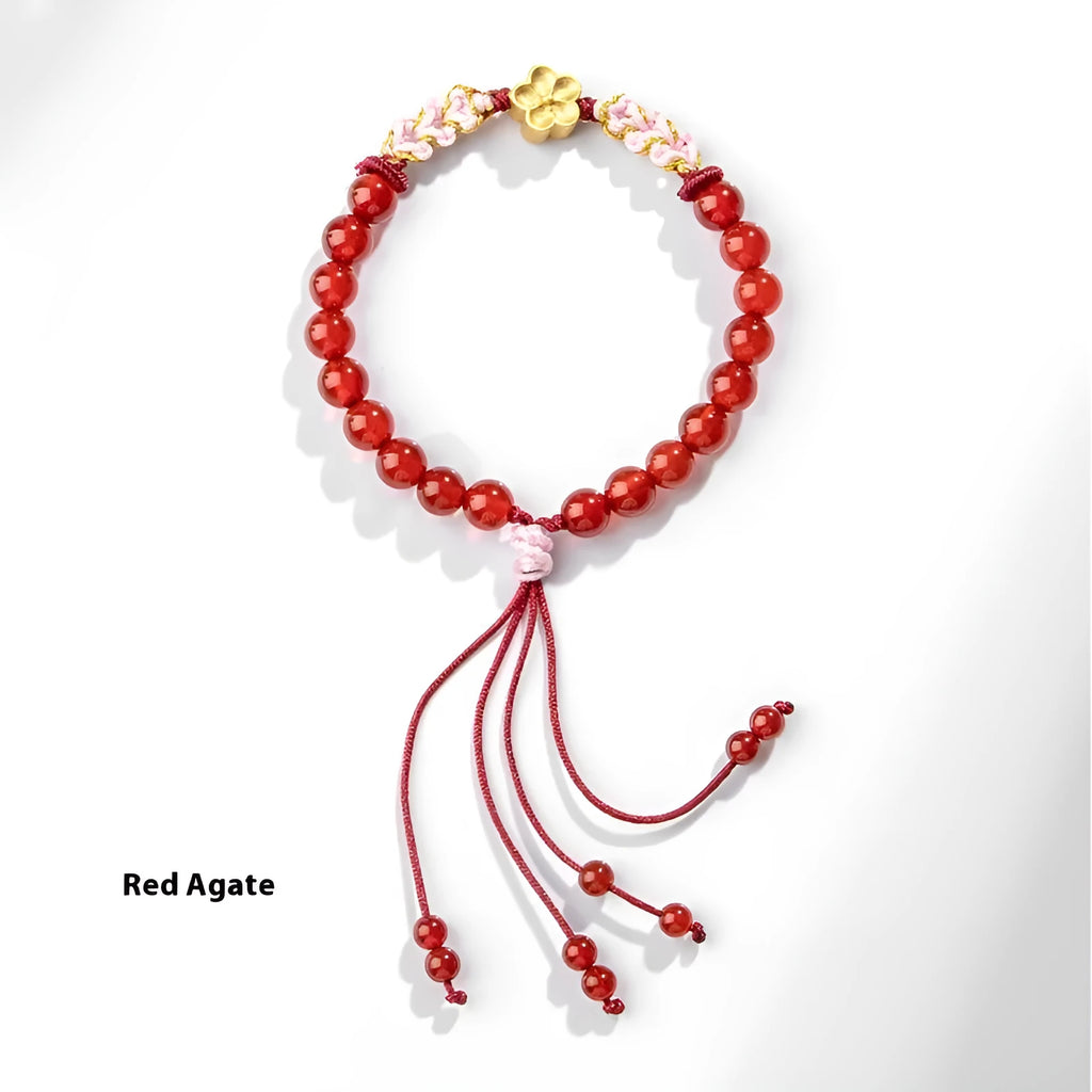 Hand-woven red rope bracelet with diamond-shaped crystal peach blossom elements in Chinese style