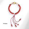 Hand-woven red rope bracelet with diamond-shaped crystal peach blossom elements in Chinese style