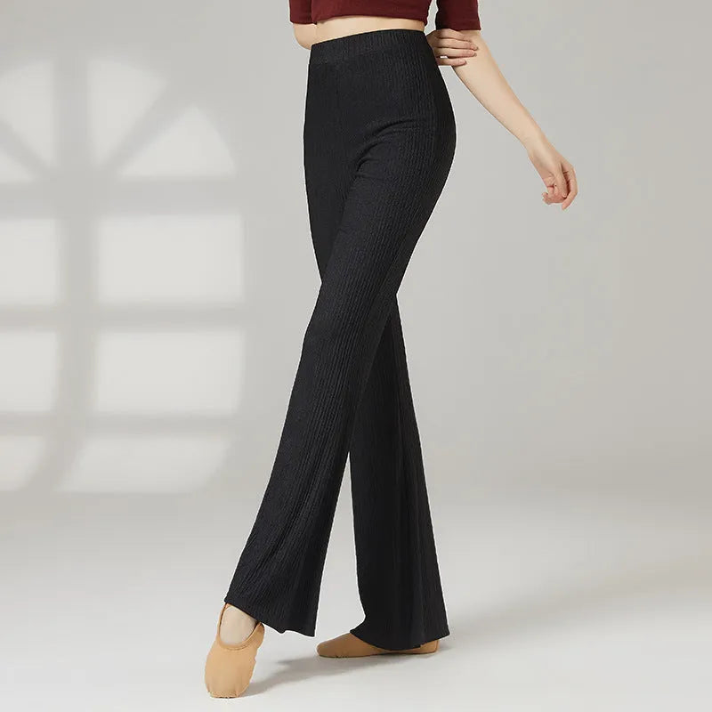 Women's solid colour polyester dance practice pants for classical ballet and body training.