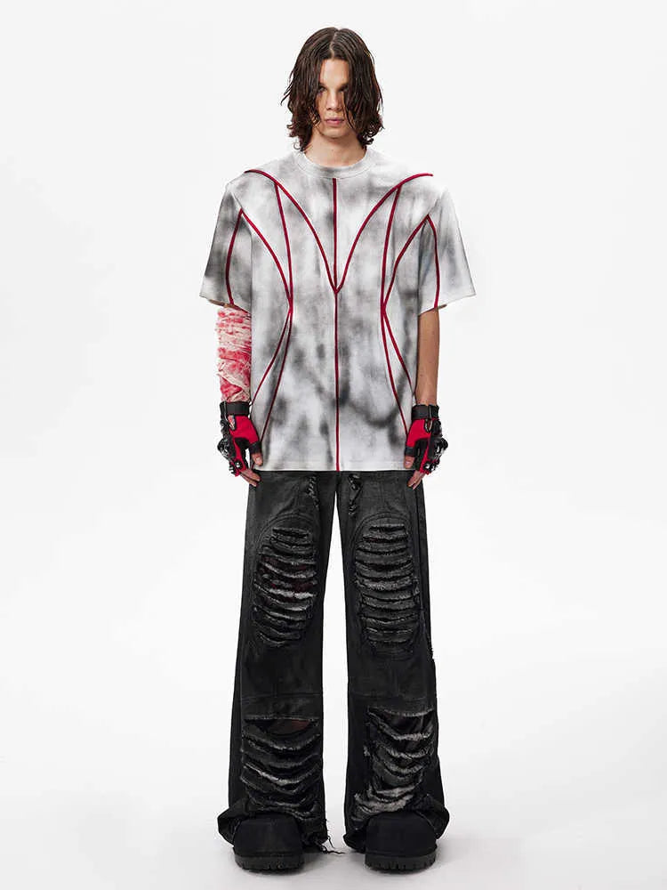 Women's short sleeve T-shirt with padded shoulders and raised line patchwork design in a round neck style.