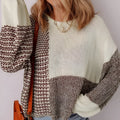 Dark khaki loose fit sweater showing back tie detail on colour block panel.
