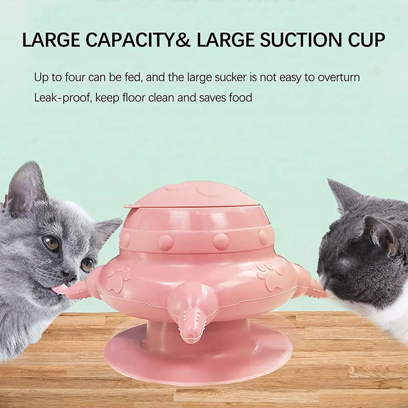 Pink silicone pet nursing bottle with bionic breast shape and four attached nipples on a flat base.