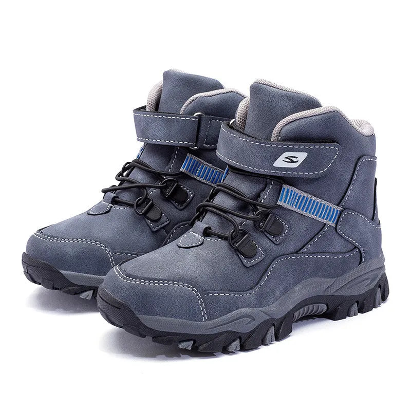 Hobby Bear black children's martin boots with a velcro strap and buckle on a waterproof artificial leather upper.