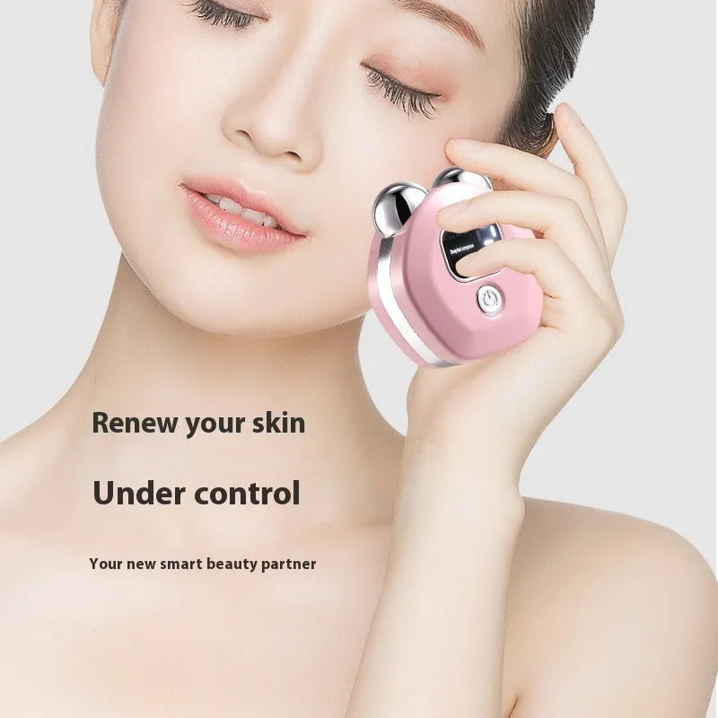 Portable micro current facial massage instrument with dual-roller head in light blue colour