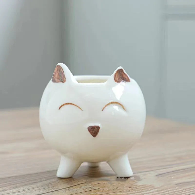 Ceramic succulent flowerpot with hand painted cartoon animal design in colourful pattern
