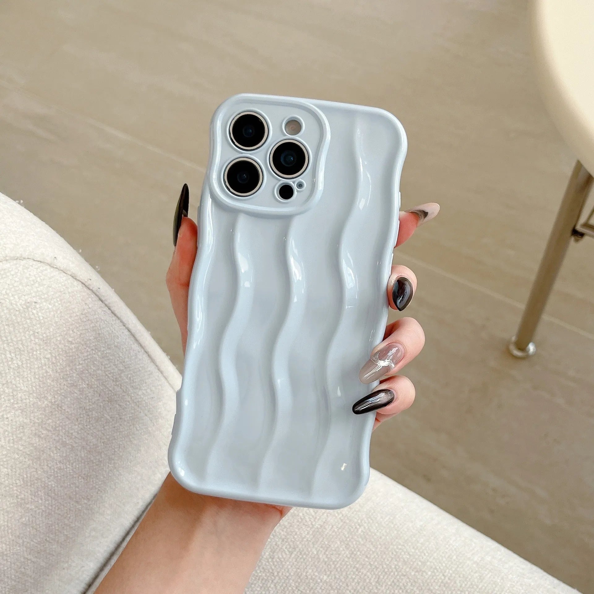 Electroplated wave stripe protective back cover case for iPhone 17 in various colours.