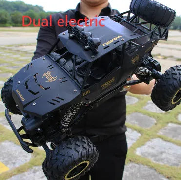 Large black 4WD remote control climbing car and smaller silver high-speed model with 2.4G remote.