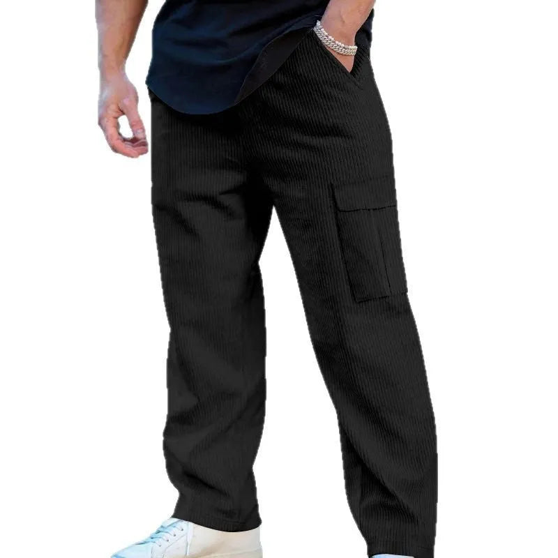 Men's loose-fitting corduroy cargo trousers in a straight-leg cut, shown in a solid colour.