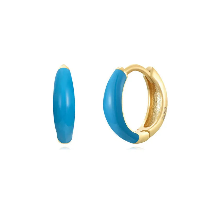 Oval-shaped curved drop earrings with colourful epoxy resin drip finish and silver metal pin.