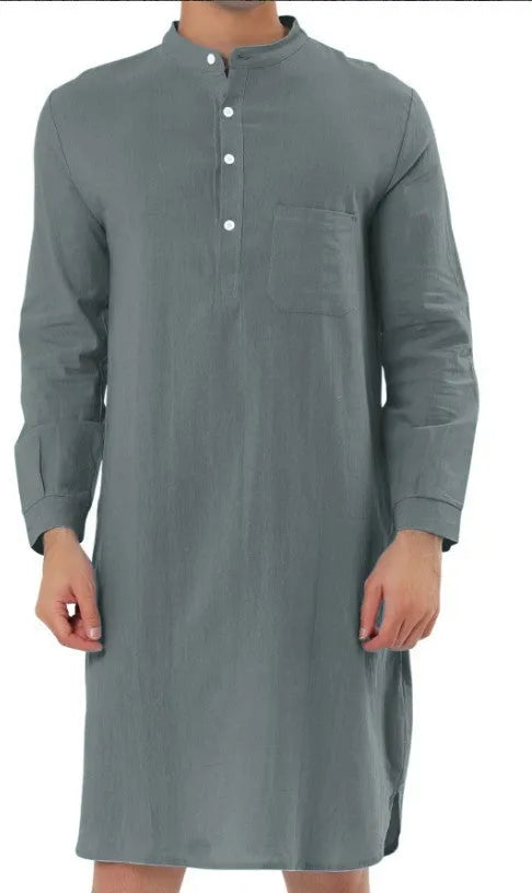Men's cotton shirt robe in light blue with front pocket and long sleeves on a model