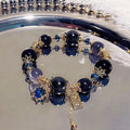 Women's galaxy colour bracelet with snowflake pendant, bow design, heart shape and cartoon character elements