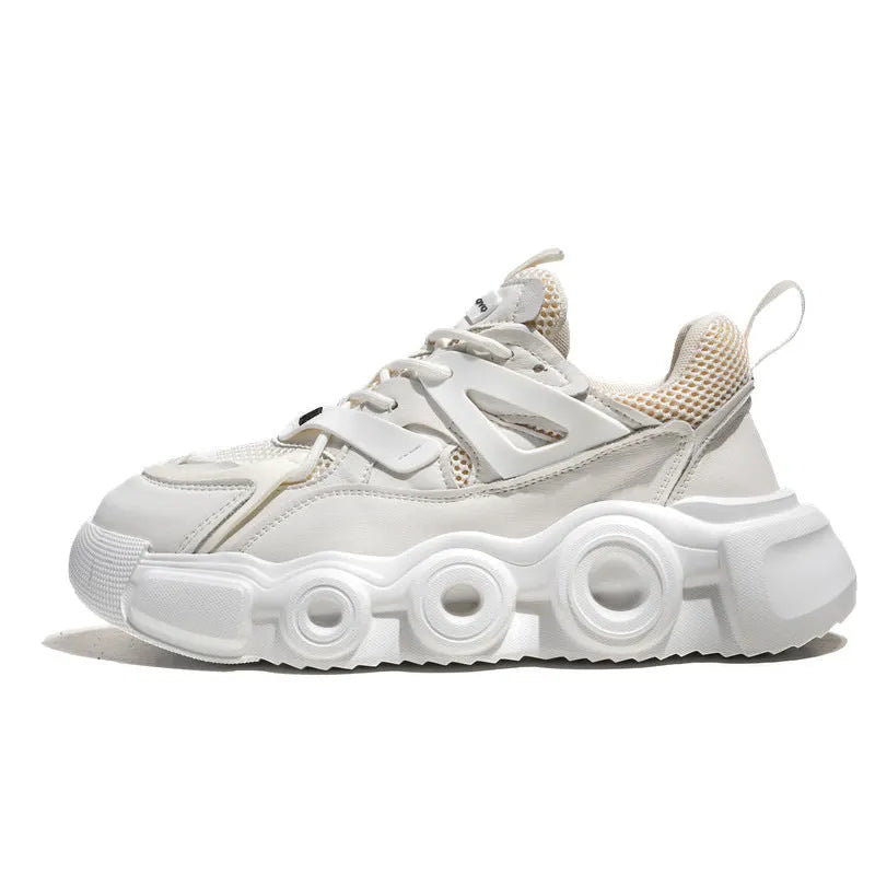 Men's black mesh sneakers with thick rubber sole, round toe, lace-up front, and abstract pattern