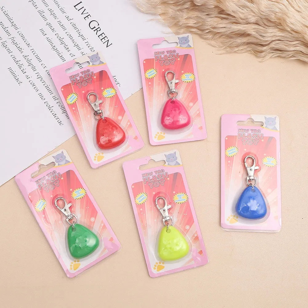 A silicone triangle-shaped pendant ornament for pets, shown in one of five colours: red, pink, blue, green, or yellow.