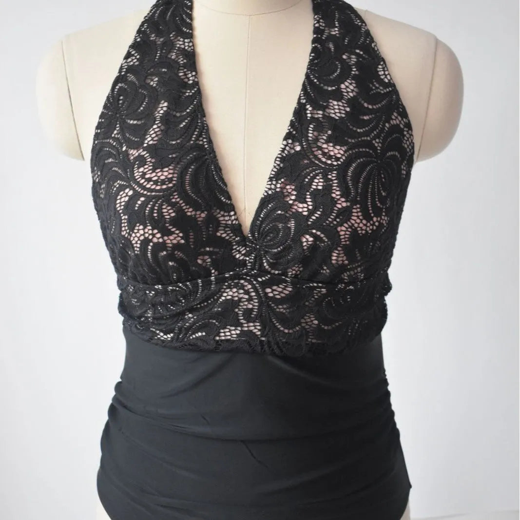 Black polyester patchwork backless tight-fitting one-piece swimsuit on display