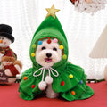 Cat Christmas tree costume in green with star ornament, size M, on a cat
