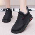 Women's black casual flat ankle boots with a round toe and non-slip rubber sole.