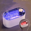Berlin blue automatic pet water fountain with triple filter and LED light on a wooden floor.