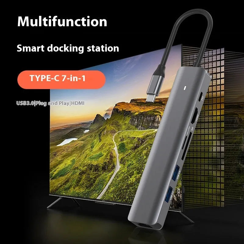7-in-1 USB C computer hub with SD card slots and charging port for laptop connectivity expansion