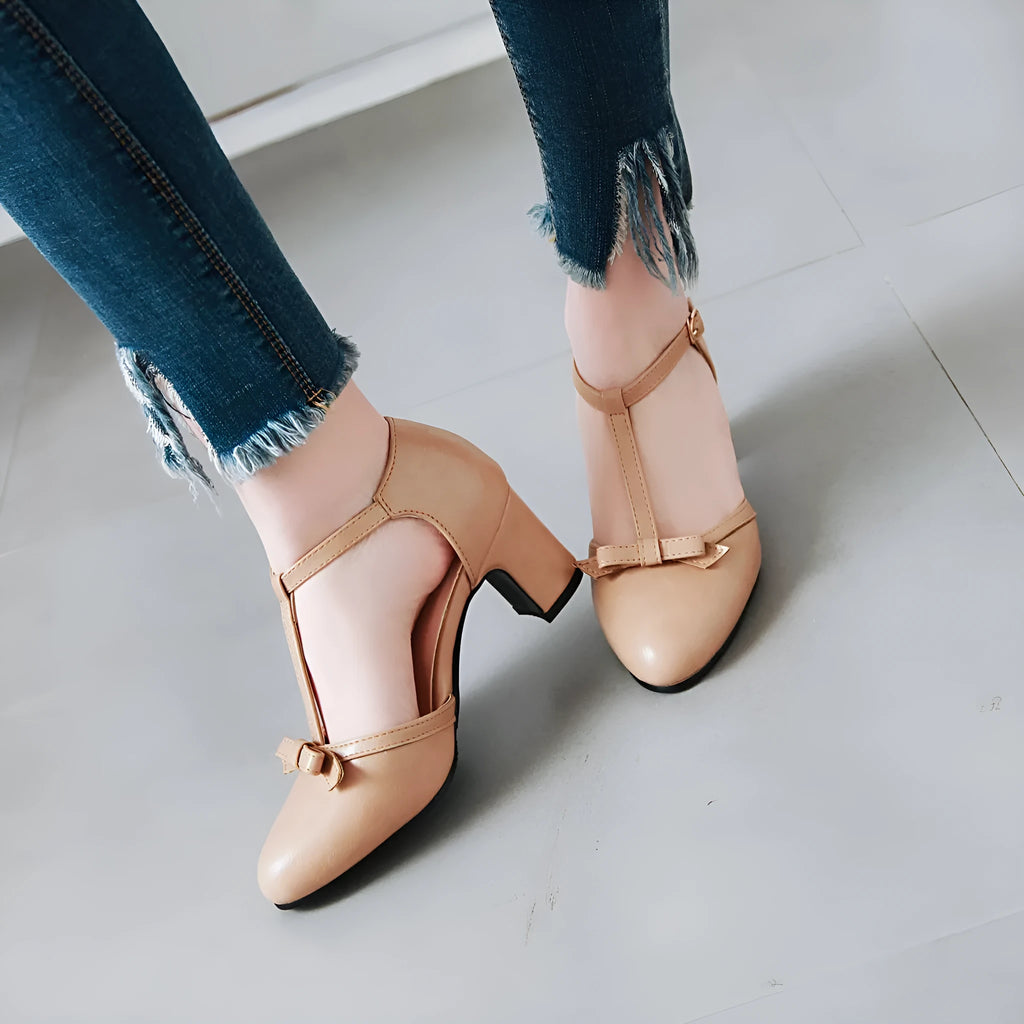 Women's chunky heel sandals with bow tie decoration and hollow out detail in apricot colour