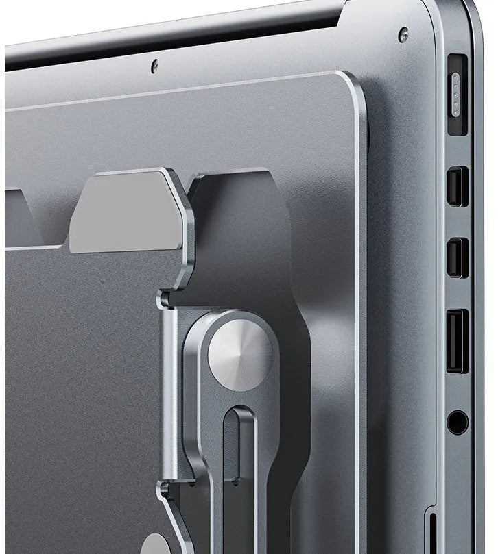 Aluminum laptop stand in folded position showing adjustable mechanism and silicone protection pads
