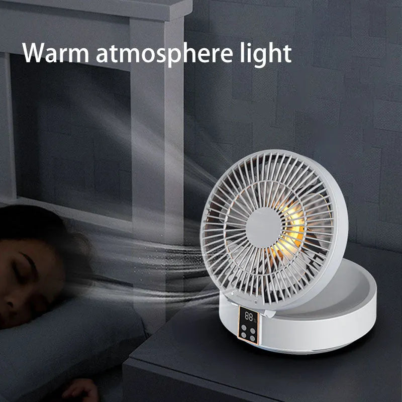 White portable folding fan with remote control on desk showing night light and adjustable angle