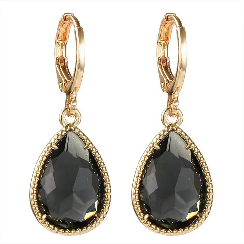 Geometric glass water drop earrings with carved Saturn design in multiple colours
