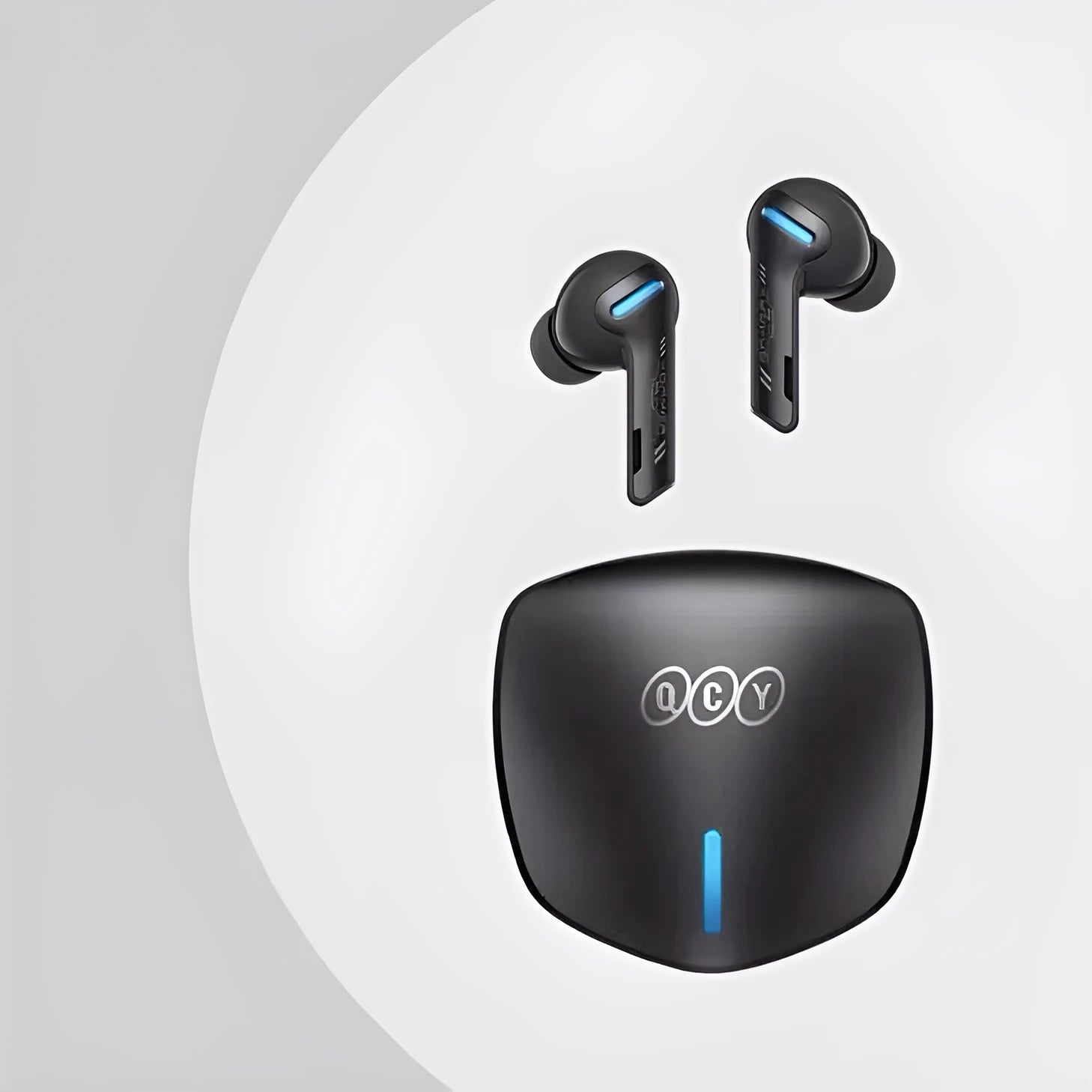 Grey QCY-G1 wireless Bluetooth gaming headset with charging case and ear tips