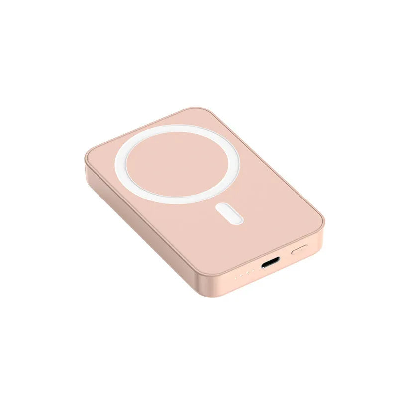Pink magnetic wireless power bank showing dimensions of 100mm by 64mm.