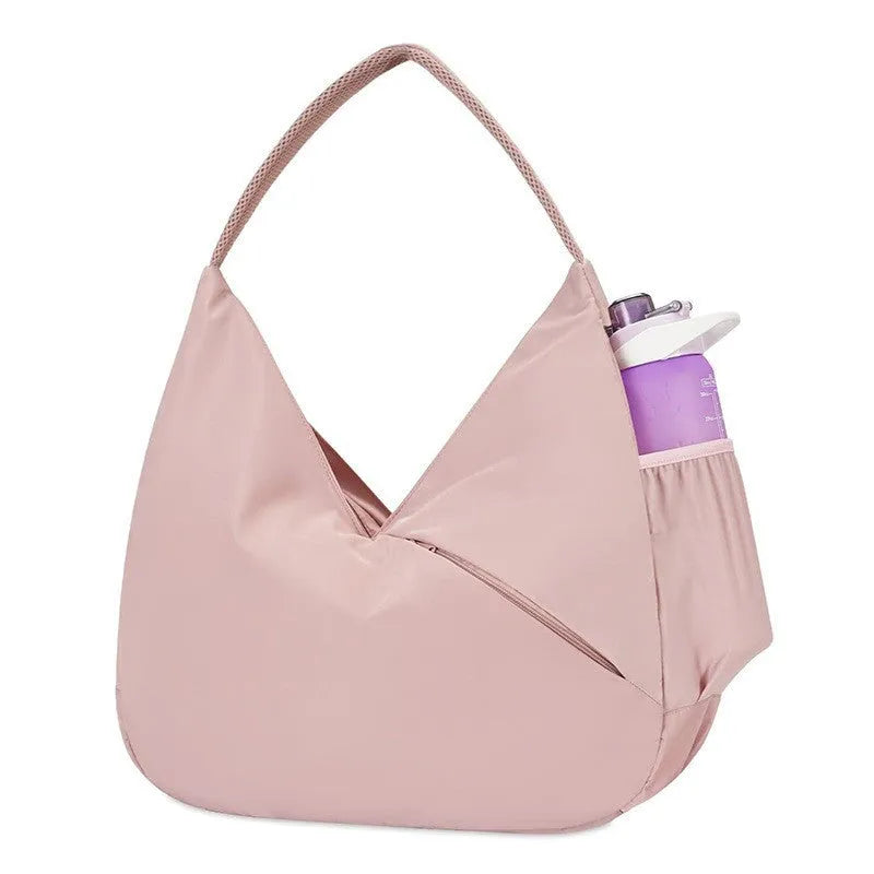 Women's cylindrical nylon fitness handbag with chain and lock detail in light green colour