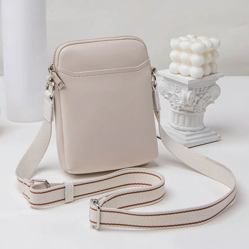 Solid colour mobile phone crossbody bag for women in black, beige, khaki, or green.