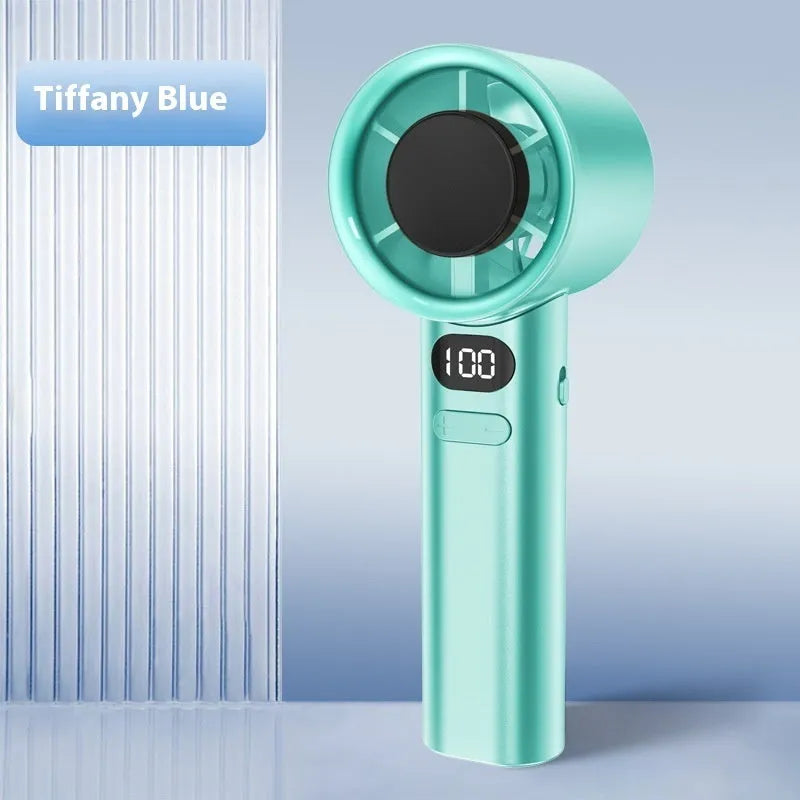 Handheld USB personal fan with variable speed control, shown in green colour with six plastic blades.