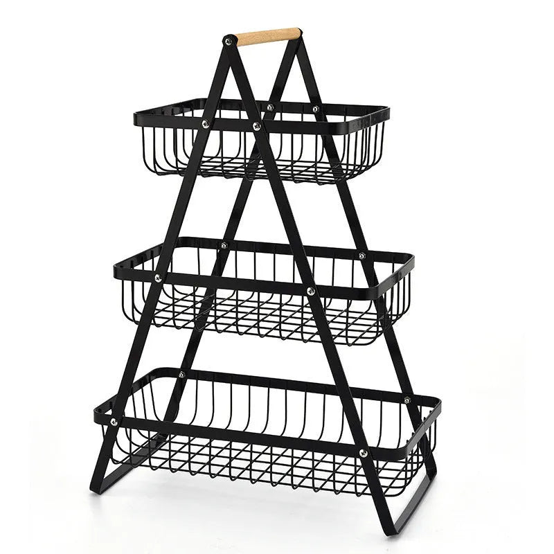 Black detachable iron double-layer fruit basket with wooden handle on tabletop