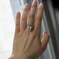 Handmade beaded elastic string love ring with geometric heart design in gold and white colour options