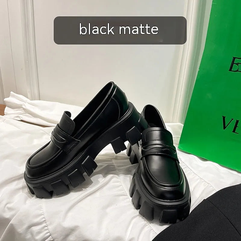 British wide-fit loafers in matte and patent leather with shallow opening and muffin heel design
