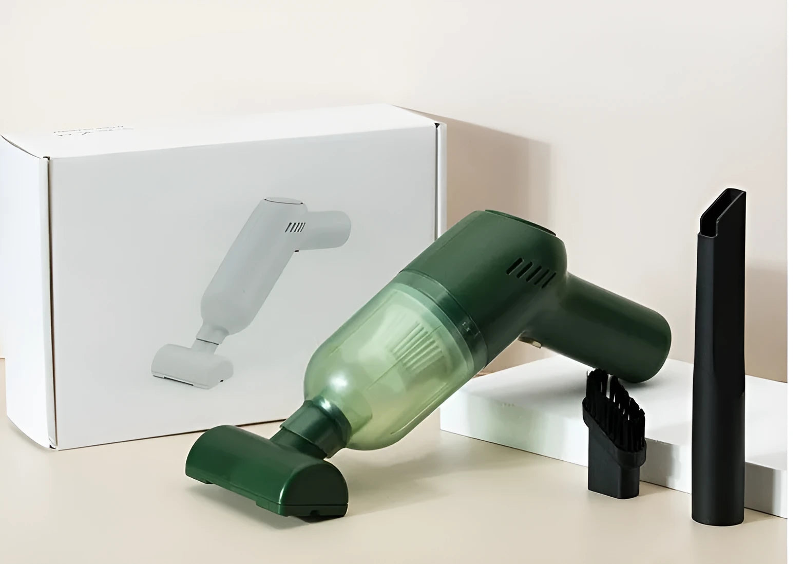 Green electric cat hair cleaner with suction heads for beds