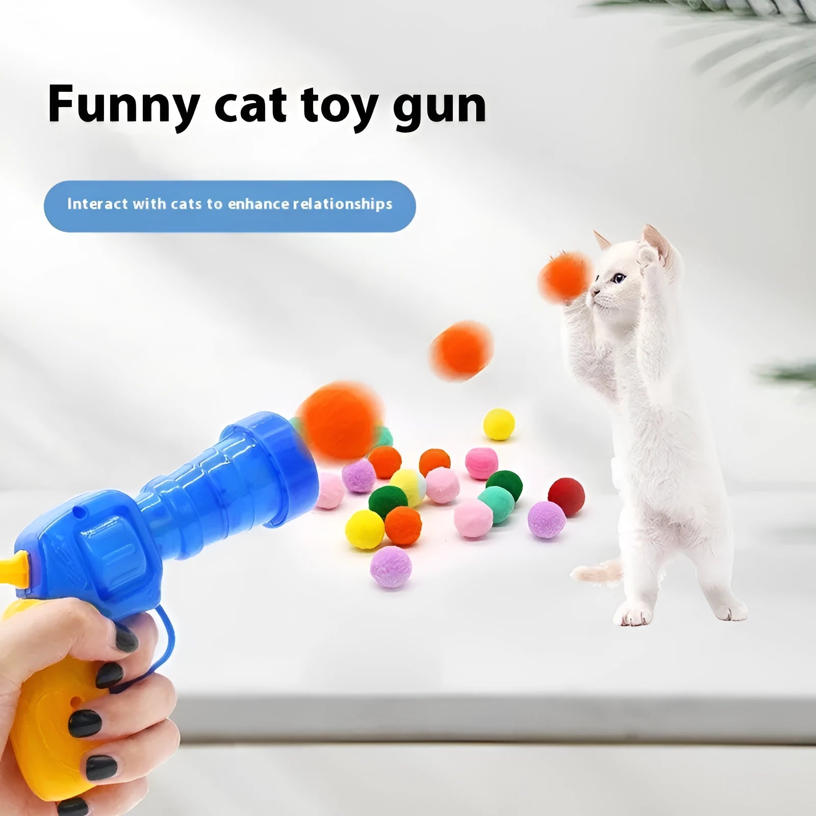 Plush ball shooter gun pet toy with multiple yarn balls for interactive fetch games