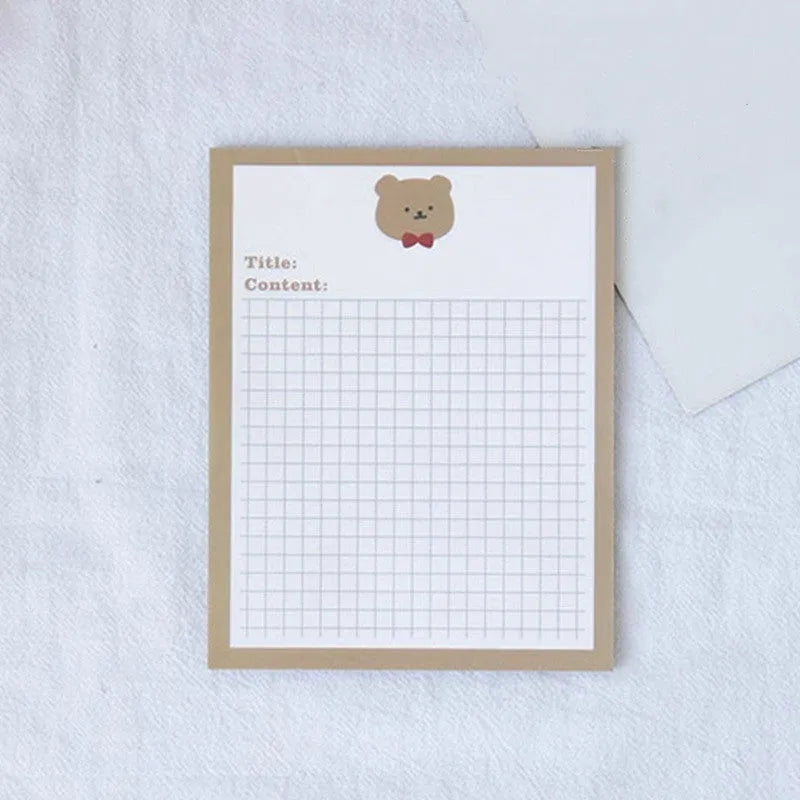 Avocado and bear cartoon design sticky note pads in large and small sizes.